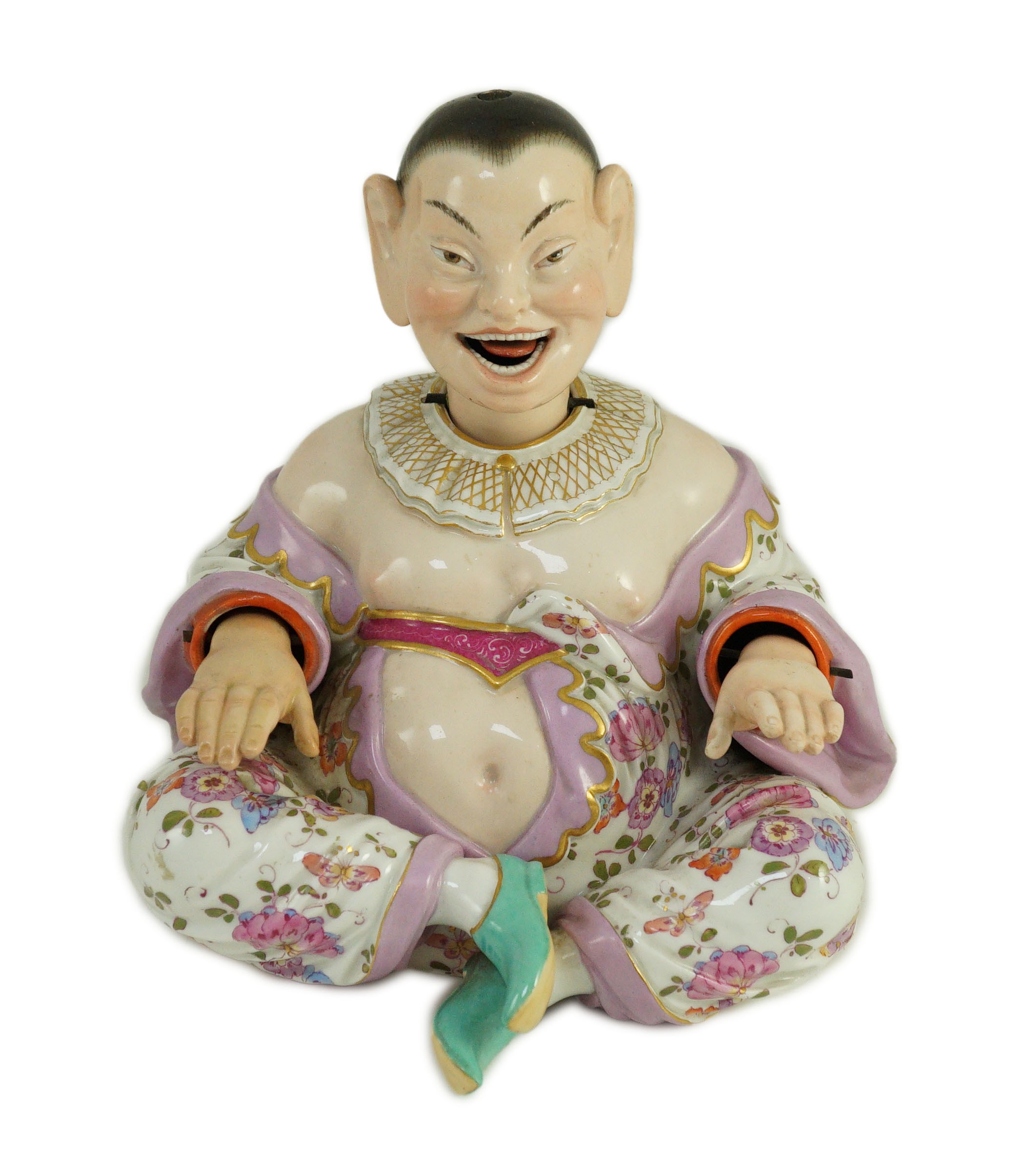 A Meissen figure of a nodding chinaman, 19th century, 17.5cm high, right hand restored